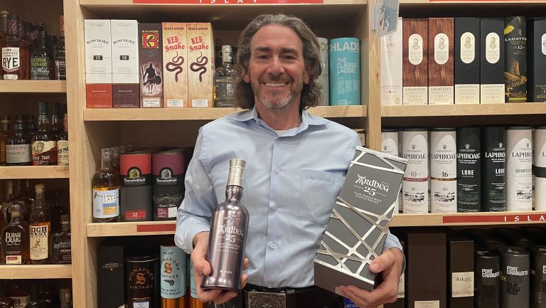 Paul McGinlay, the vice president and general manager of The Whisky Shop, holding the Ardbeg 25 Years Old. Photo courtesy of The Whisky Shop.