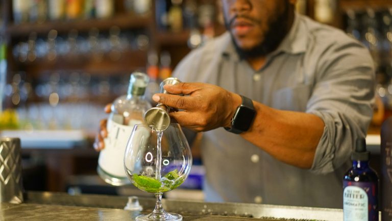 Coltivare beverage director Gregory Thompson mixing a Not and Tonic