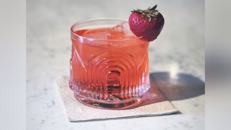 A detailed photograph of the Jane Jane's coconut and strawberry Negroni