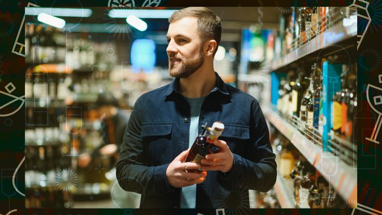 A consumer browses the aisles of a liquor store