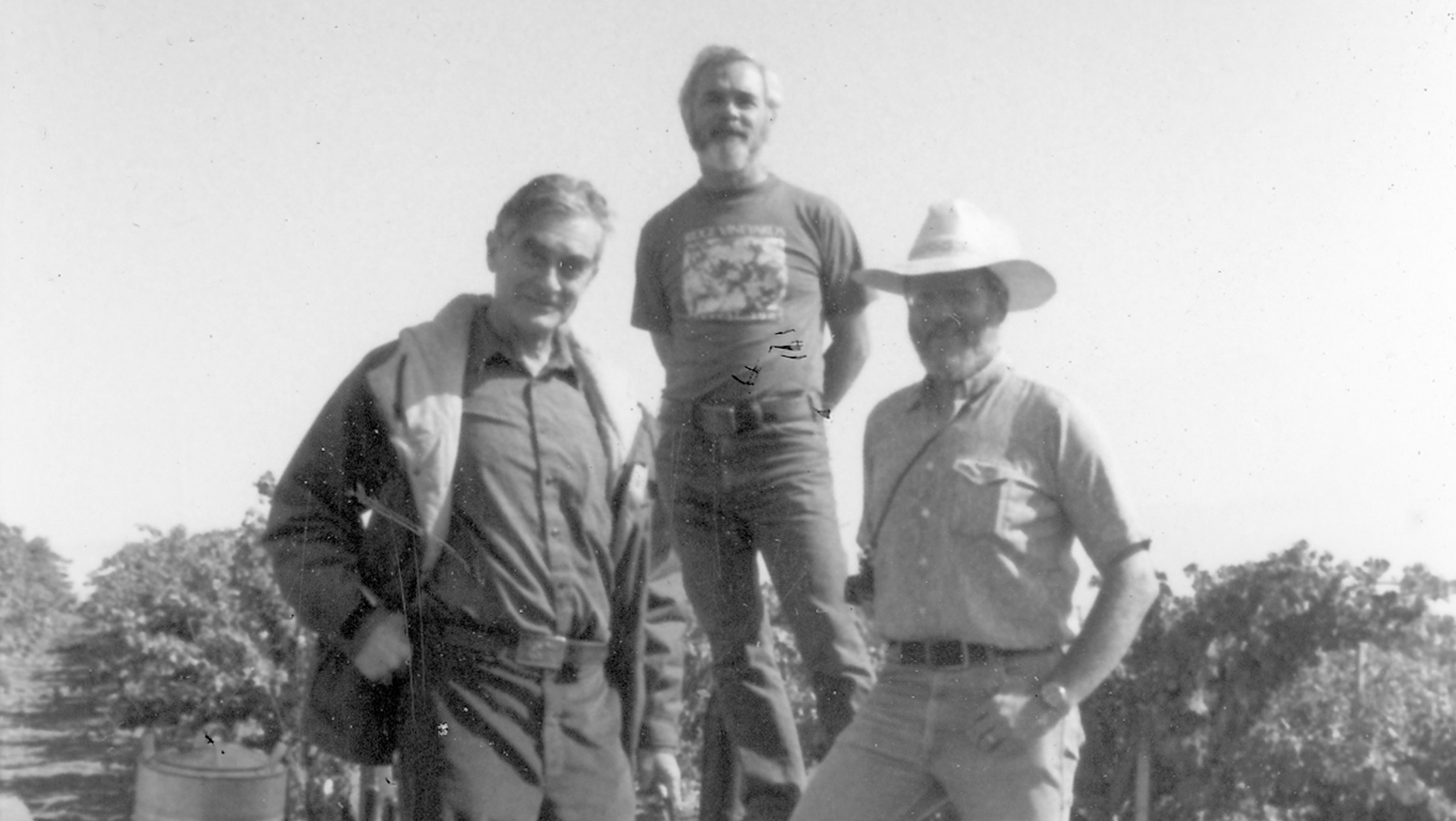 A decades-old black and white photo of three of the original founders of Ridge Vineyards