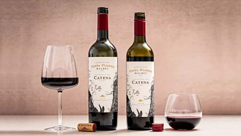 An image of two Catena wine bottles next to two wine glasses