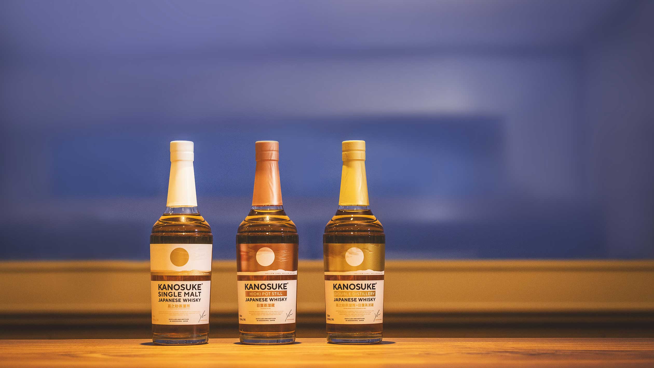 A lineup of three different whiskey bottles from Kanosuke Distillery's collection