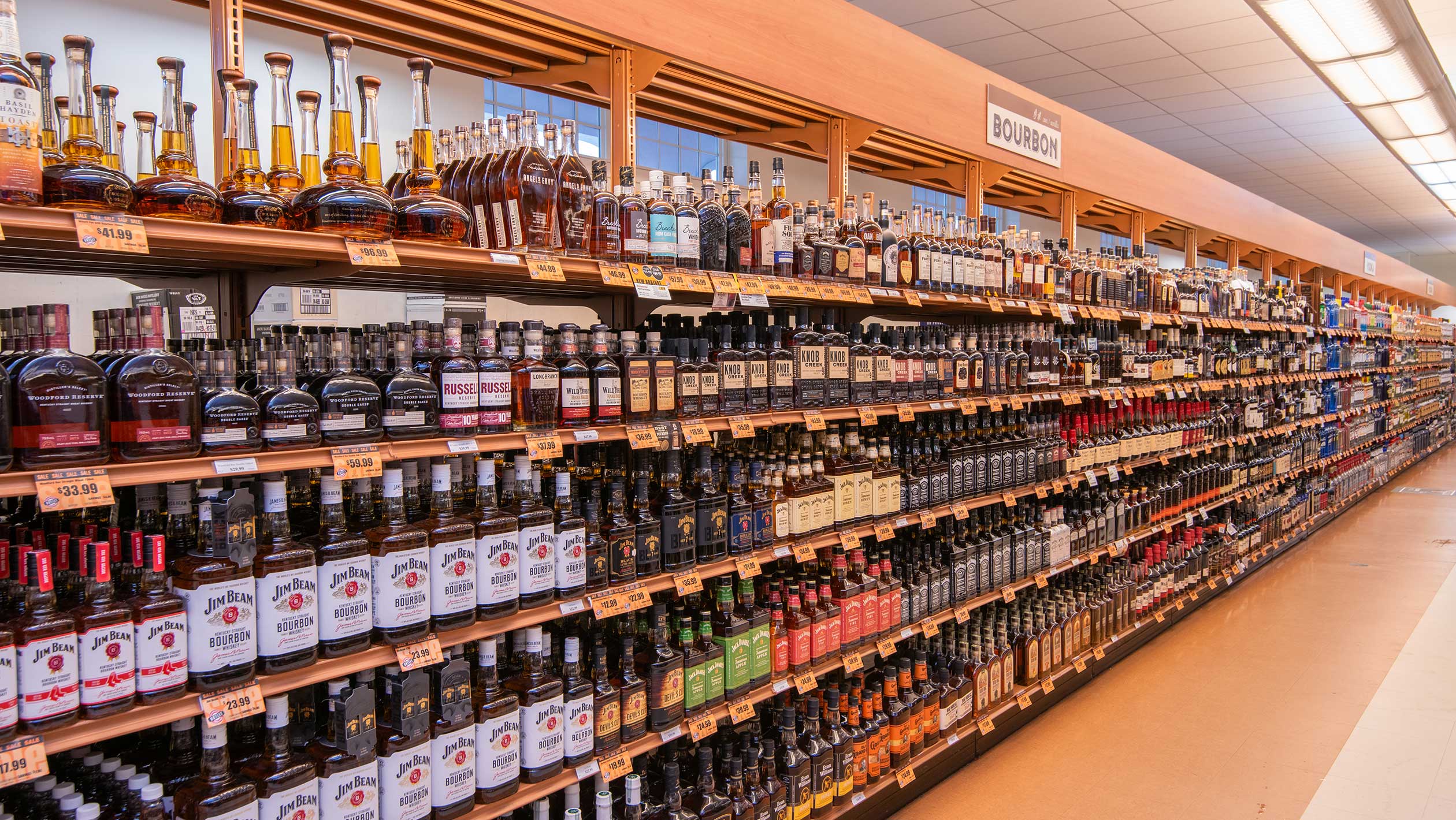 An interior photo of stocked spirits shelves