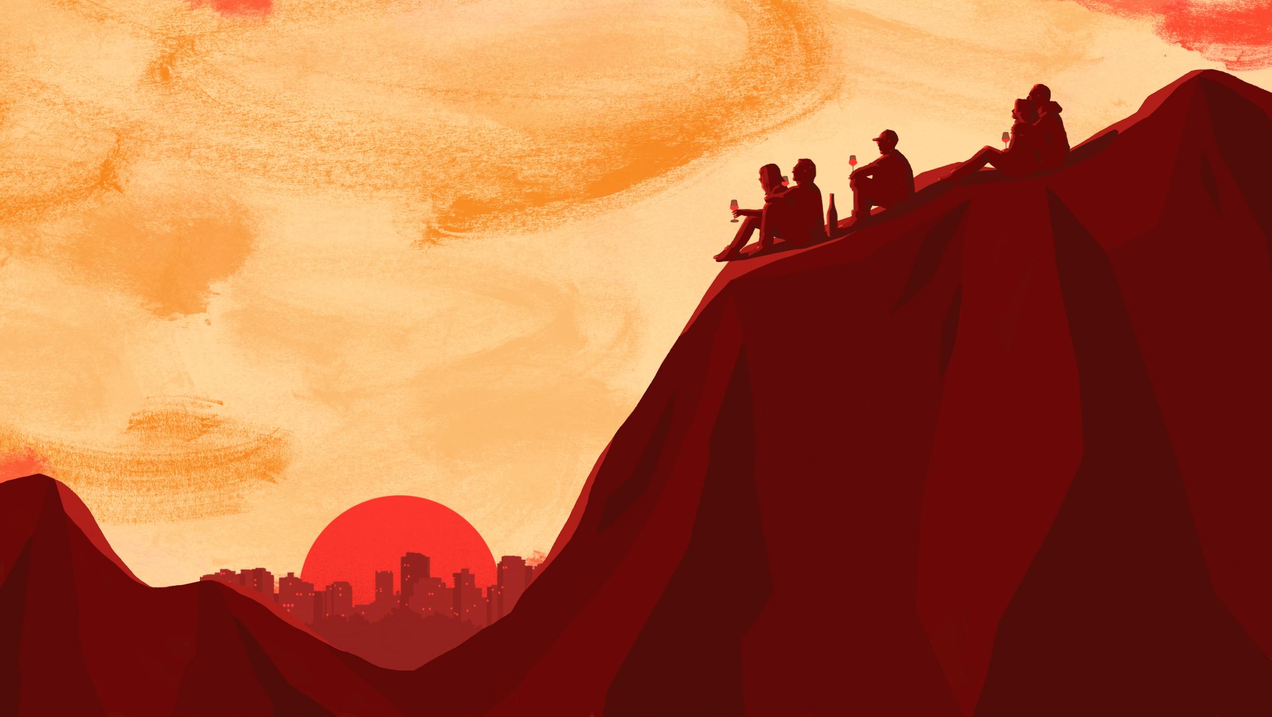 People with wine overlooking the city