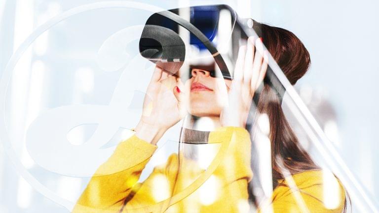A woman experiencing virtual reality at a brewery