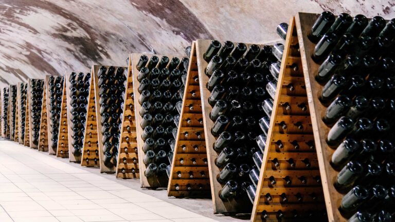 Stacks of Champagne bottles.