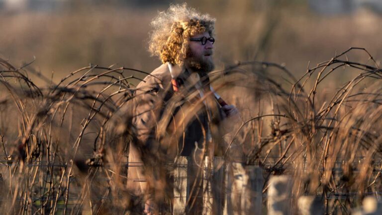 A photo of Sylvain Pataille in the vineyards.