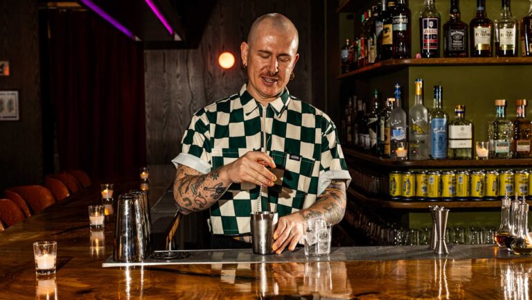 Iain Griffiths, the owner of Bar Snack, mixing a drink