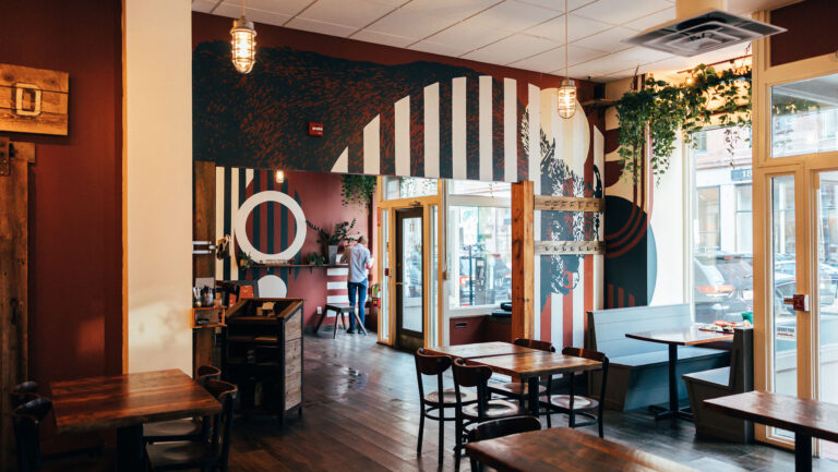 At the cocktail bar Sur Lie in Portland, Maine, owner Krista Cole says her staff, who are naturalized U.S. citizens, have missed work out of fear of leaving their homes. Photo by Dawnson Renaud Film and Photo.